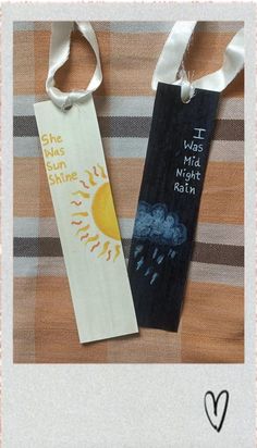 two bookmarks with the words, she was my night rain and she was your sun shine