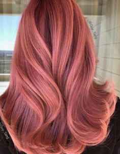 30 Best Rose Gold Hair Ideas | YourTango Rosy Hair, Rosy Red Hair, Rose Gold Hair With Lowlights, Rose Gold Dyed Hair, Rose Red Hair Color, Fun Color Hair Ideas, Golden Pink Hair, Rose Gold And Copper Hair, Warm Pink Hair Color