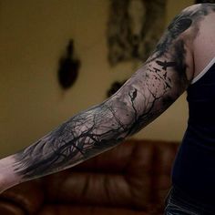 a person with a tattoo on their arm