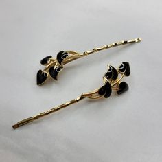 These Vintage Enamel Leaf Bobby Pins are elegant and unique, and will go with any women's accessory collection. Made in Austria in the late 1970's. Feel whimsical and beautiful as soon as you put them in your hair! These bobby pins are extremely popular among vintage enthusiasts and admirers. Sold in a pair of two!Features:- Made in Austria- Authentic Vintage- Designed with Beautiful Shimmering Enamel Dimensions:- 2.25" x .75" Enamel Hairpin, Vintage Hair Pins, Fancy Bobby Pins, Bobby Pins With Bird Design, Gold Victorian Hairclip Item, Vintage Decorative Hair Pins, Decorative Bobby Pins, Enamel Hair Clip, Ornate Vintage Hairpin Design