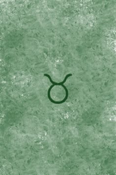 an astrological zodiac sign on a green background