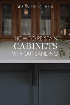 the words how to restain cabinets without sanding are in front of a kitchen counter