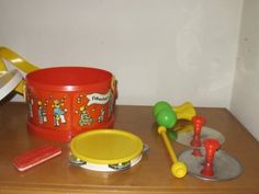 a wooden table topped with lots of toys