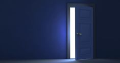 an open door in a dark room with light coming from it's opening hole