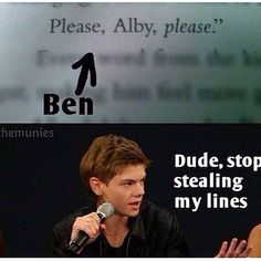 a man holding a microphone in front of a sign that says ben dude, stop stealing my lines