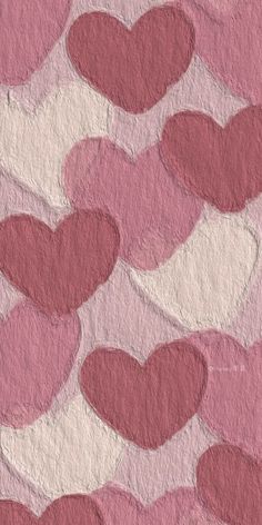 pink and red hearts are arranged in the shape of heart shapes