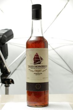 a bottle of alcohol sitting on top of a table