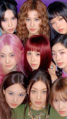 a group of young women with pink hair and blue eyes are posing for a photo