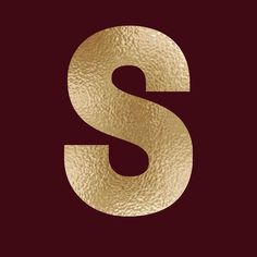 the letter s is made out of gold foil and sits on a maroon background with an elegant