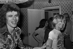 black and white photograph of two people standing next to each other