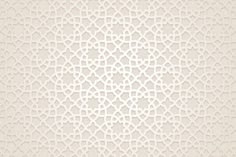 a white wallpaper with an intricate design