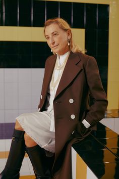 Designer 101, Vault 101 - Prada 101: A history - Dive into the rich, complex history of one of Italy’s most prominent fashion houses: Prada. From their very Fashion Designer Prada, Miuccia Prada 90s, Miuccia Prada Outfits, Prada Fall 1997, Devil Wears Prada White Coat, Miuccia Prada Home, Miuccia Prada Personal Style, Miuccia Prada Style, Miuccia Prada Runway