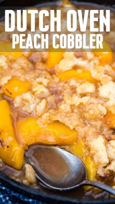 a close up of food in a skillet on a table with a spoon next to it