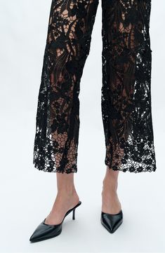 Your favorite standby jeans get a fancy-pants update in this high-waist style, which starts in classic denim studded with a mix of crystals and then shifts to sheer panels of guipure lace. 31 1/2" inseam; 24" leg opening; 11" front rise; 15" back rise Zip fly with button closure Five-pocket style 94% cotton, 4% polyester, 2% spandex Machine wash, line dry Imported Valentine Wear, Rose Cardigan, High Rise Wide Leg Jeans, Lace Splicing, Fancy Pants, Embellished Jeans, Floral Style, Classic Denim, Favorite Things List