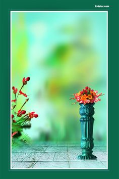 there is a vase with flowers in it next to another vase on the ground,