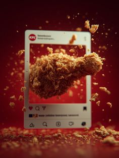 a fried chicken on top of a computer screen in front of a red background with an instagram logo