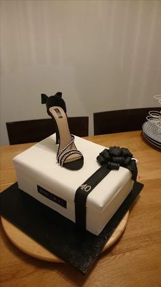 Jimmy Choo Cake Design, Jimmy Choo Cake, Jimmy Choo Shoes Cake, Jimmy Choo Cake Ideas, Elegant Black Shoe Cake, Shoe Theme Cake, Shoe Birthday Cake, Black High Heel Shoe Cake, Luxury Shoe Themed Cake