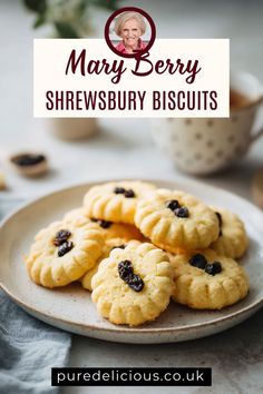some cookies on a plate with the title mary berry's shewsbury biscuits