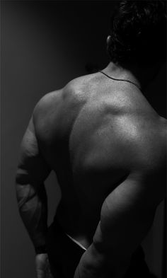 a man with his back turned to the camera