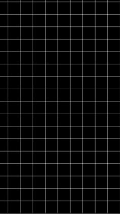 a black and white tiled wall with square tiles on the bottom right hand corner, as well as horizontal lines in the middle