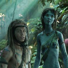 the movie avatars are all dressed up in blue and green makeup, with one man wearing