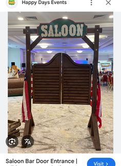 the saloon bar door entrance is decorated with an american flag banner and wooden slats