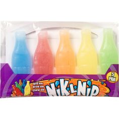 four different colored gummy bottles in a package