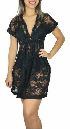 Lace Mini Dress For Beachwear, Short Sleeve Beach Dress With Lace Trim, Lace Beachwear Dresses With Lace Trim, Sheer Lace Beachwear Dresses, Black Beachwear Dress For Beach Cover-up, Black Lace Beach Cover Up, Black Lace Swim Cover Up, Fitted Lace Beachwear Cover-up, Beachwear Black Mini Dress For Beach Cover-up