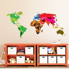 a wall decal with the world map in different colors on it's side