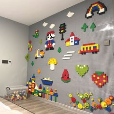 a room with legos and toys on the wall