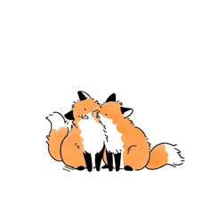 two foxes are sitting next to each other