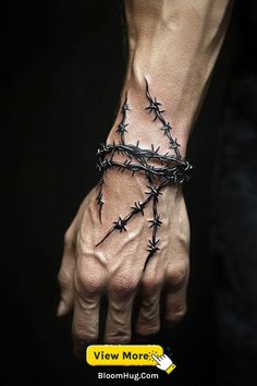 a man's arm with barbed wire on it