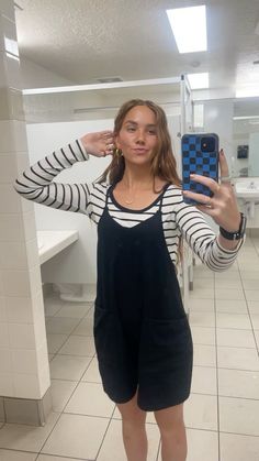 Black shorts romper with black and white long sleve underneed Romper Shorts Outfit, What To Wear With A Black Vest, Induction Outfit Ideas, Athletic Romper Outfit, Black Workout Romper Outfit, Black Beach Overalls And Rompers, Black Romper With Converse, Black Romper Aesthetic, Black Romper Outfit