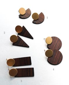several pieces of wood are arranged in the shape of circles and shapes that appear to be shaped