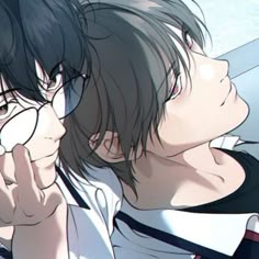 two people are sitting next to each other