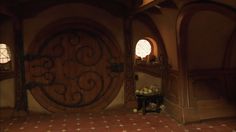 an image of a door in the middle of a room that looks like a hobbot