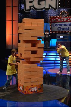 two young boys playing with blocks on the set of tv program