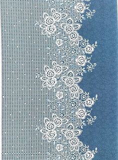a blue background with white lace and flowers on the bottom half of it, as well as an intricate design