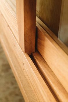 a close up view of a wooden window frame