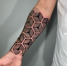 a man with a tattoo on his arm