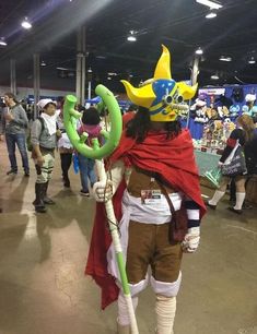 you can wear a red cape that covers your left shoulder down to the arm area, and carry the iconic green slingshot on your right hand as your weapon. Sogeking Cosplay, Simple One Piece Cosplay, One Piece Characters To Cosplay, Usopp Costume, Easy One Piece Cosplay, Usopp Cosplay, Soul King Brook Cosplay, Straw Hat Cosplay, One Piece Cosplay Ideas
