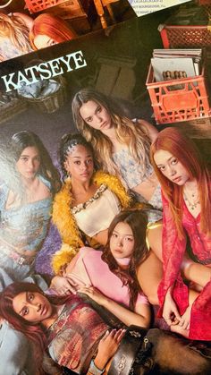 the cast of girls next to each other in front of an advertisement for kaseye