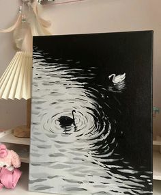 a black and white painting of a swan floating on water