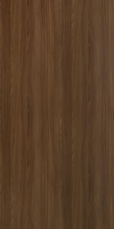 a close up view of the wood grain pattern on this wallpapered surface, which is very dark brown