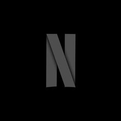 the letter n is cut in half and placed on a black background