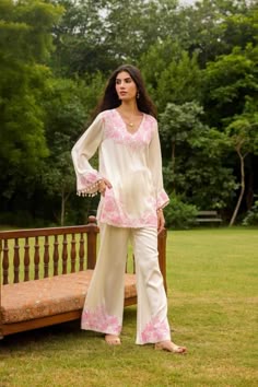 Kashmiri cotton kurta sets are a beautiful blend of tradition, elegance, and comfort, making them a must-have in every woman’s wardrobe. Whether you're dressing up for a special occasion or looking for a comfortable yet stylish option for everyday wear, these kurta sets offer unmatched versatility. In this guide, we'll help you choose the perfect premium kurta set for women and explore the trending cotton co-ord sets that are taking the fashion world by storm. Shopping Kurtis, Pakistani Kurta Style, White Kurta Top, Womens Kurta, Classic Indian Wear, Kurta Design Women, Kashmiri Kurta Set, Different Kurti Styles, Cotton Indian Suits