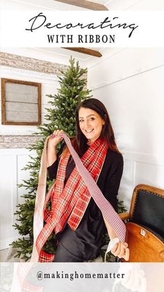 a woman sitting on the floor with a christmas tree in front of her and text overlay that reads, decorating with ribbon