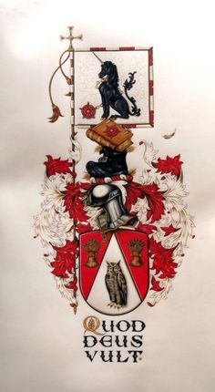 a coat of arms with two cats on it