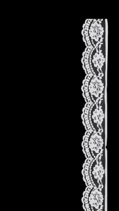 a white lace border on a black background