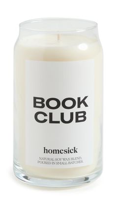 a candle with the words book club on it